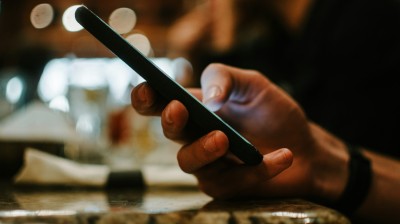 A person using a mobile phone
